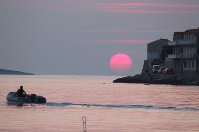 Scenic view of sea at sunset