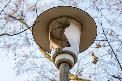 Low angle view of broken lamppost