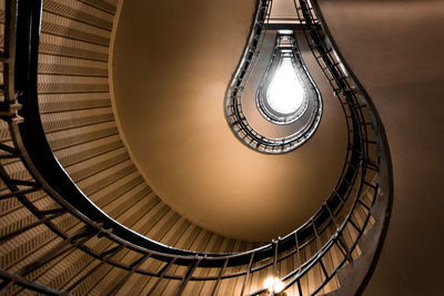 Directly below shot of spiral staircases in building