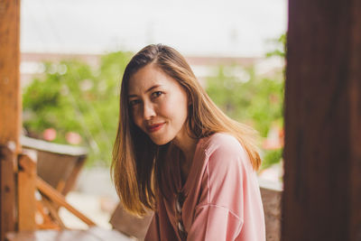 Portrait of woman at home