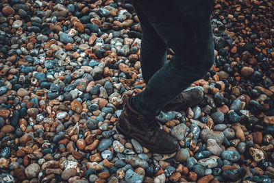 Low section of man standing outdoors