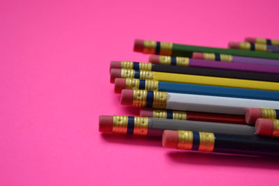 Close-up of multi colored pencils on table
