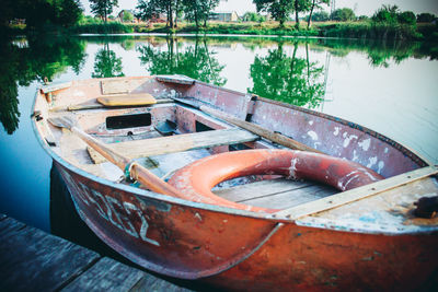 High angle view of boat moored in lake