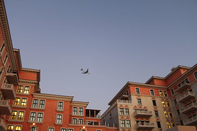 Low angle view of buildings against clear sky