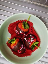 High angle view of strawberry in plate on table