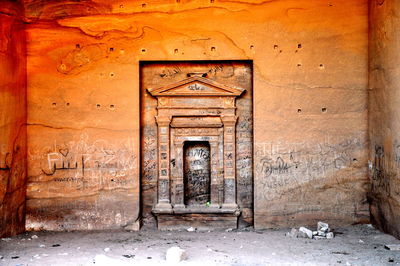 Closed door of abandoned house in jordan at petra