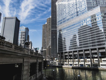 Low angle view of skyscrapers against sky