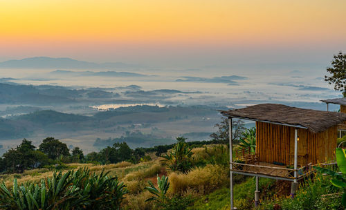Scenic view of mountains against sky during sunset