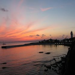 Scenic view of sea against sky during sunset