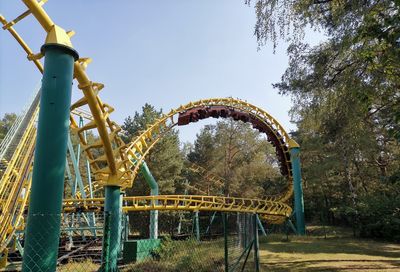 Ferris wheel in park against sky