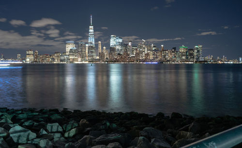 Illuminated buildings in city at night