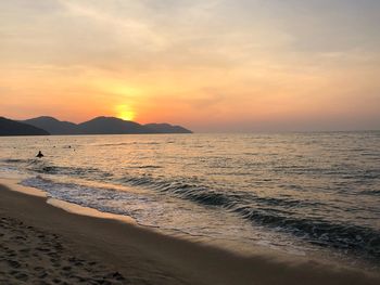 Scenic view of sea against sky during sunset