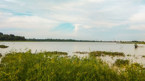 Scenic view of lake against sky