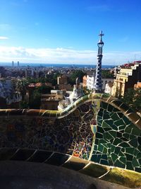 View of cityscape against blue sky