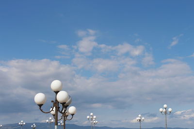 Low angle view of balloons against sky