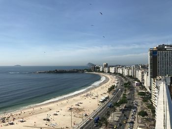 Panoramic view of beach against sky in city
