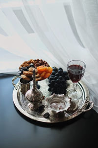 High angle view of fruits in glass on table