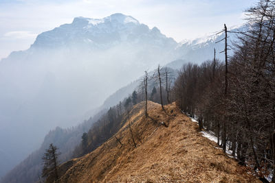 Scenic view of mountains against sky during winter