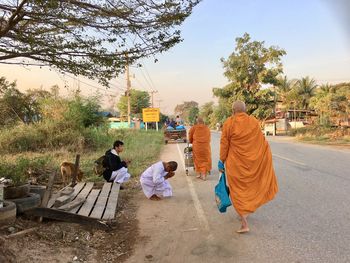 Rear view of people at temple