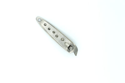 Directly above shot of nail clipper on white background