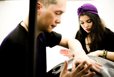 Young couple kissing in hands