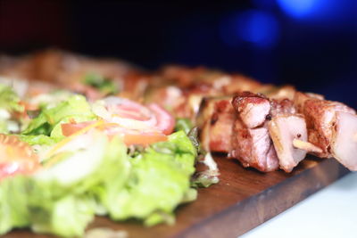 Close-up of chopped meat on cutting board