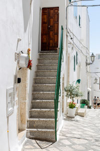 Beautiful view of the narrow staircase of a house in the city of ostuni.