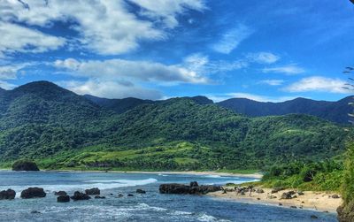 Scenic view of beach against sky