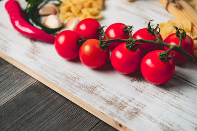 High angle view of cherry tomatoes on table