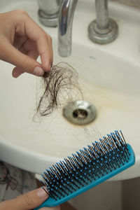 Hair in the comb that clogs the pipe