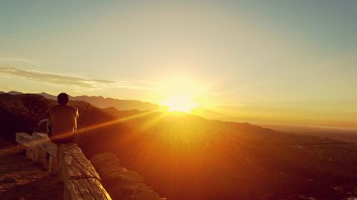 Scenic view of landscape against sky during sunset