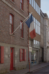 The french tricolore flies in jersey on liberation day