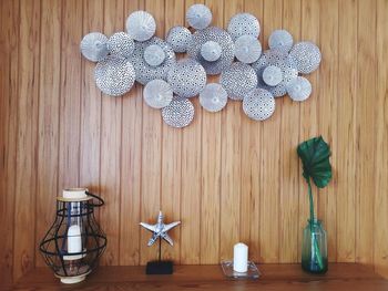 Close-up of decoration on wooden wall at home