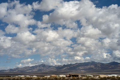 Scenic view of landscape against cloudy sky