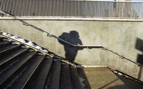 Shadow of man on staircase