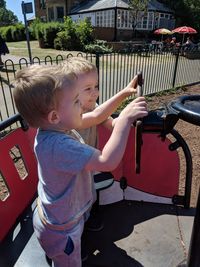 Cute boys playing at playground