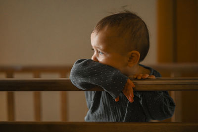 Close-up of boy looking away