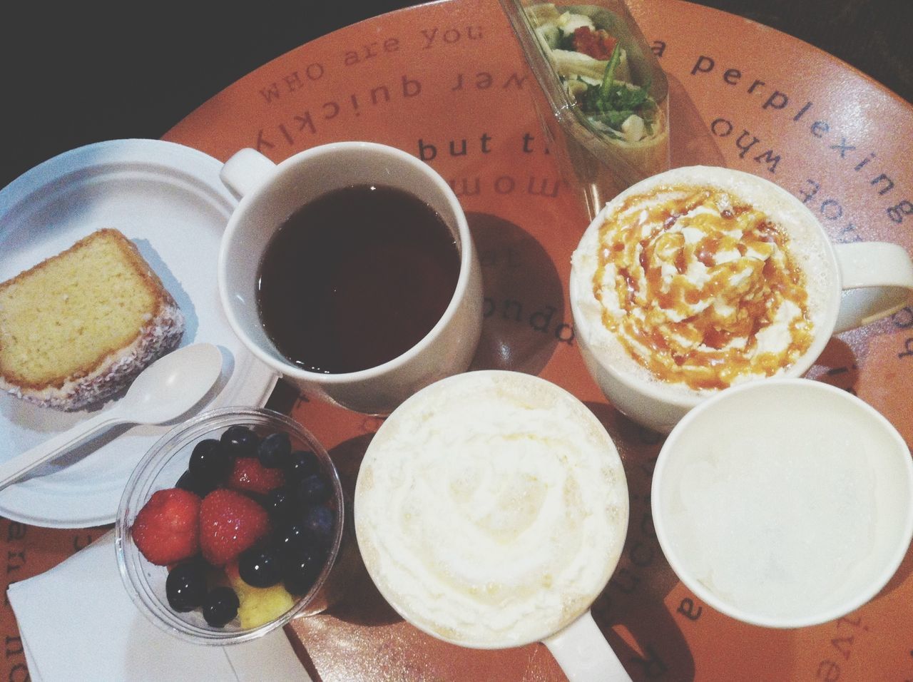 food and drink, indoors, freshness, still life, food, table, high angle view, healthy eating, drink, plate, coffee cup, ready-to-eat, directly above, bowl, sweet food, variation, refreshment, indulgence, coffee - drink, cup