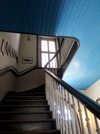 Low angle view of spiral staircase in building