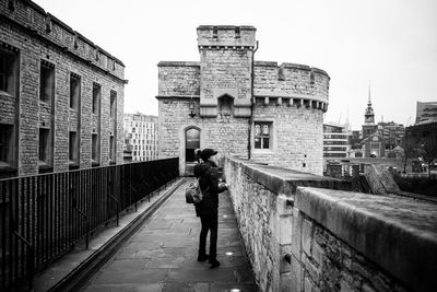 Full length of woman walking in city