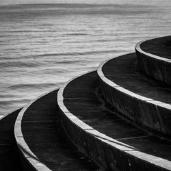 High angle view of pier amidst sea