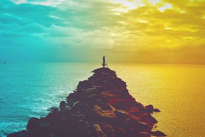 Scenic view of sea at sunset
