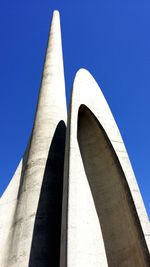 Low angle view of built structure against blue sky