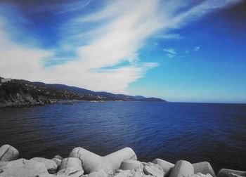 Scenic view of sea against blue sky