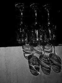 Close-up of wine bottles on table