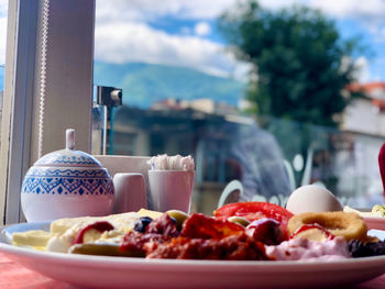 Close-up of breakfast served on table