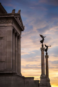 Sunset over the vittorio emanuele ii monument in rome, italy