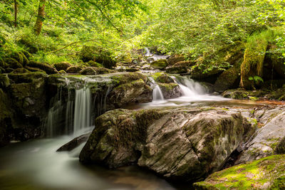 Long exposure of a waterfall on the hoar oak water river at watersmeet in exmoor national park