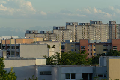 Buildings in city against sky