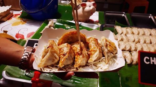 Close-up of woman holding food